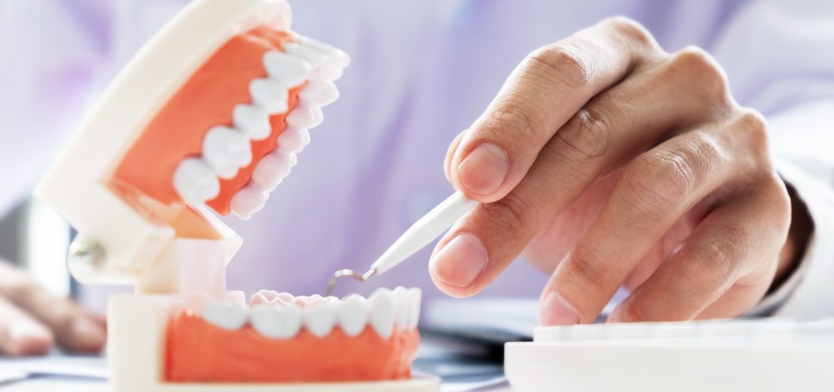 What is the Difference Between Teeth Restoration and Teeth Filling